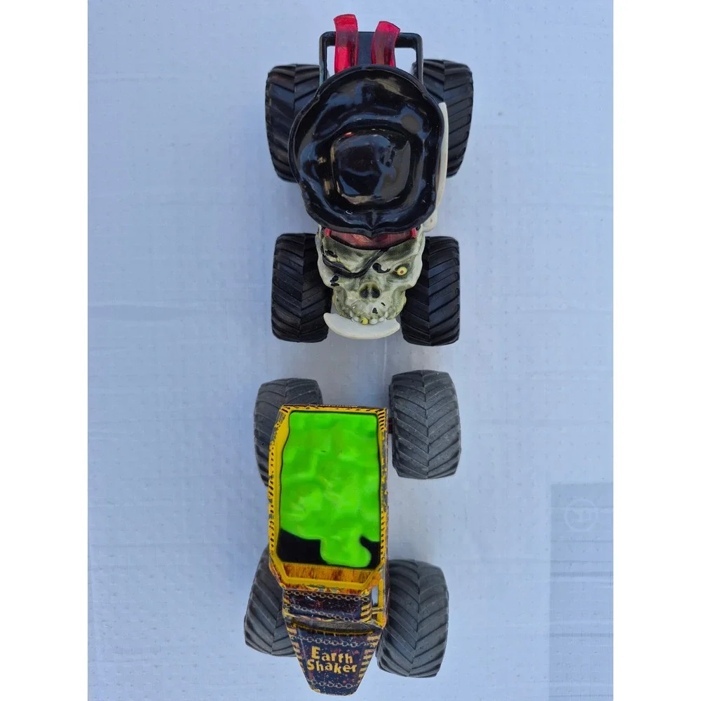 Monster Jam Pirates Curse and Zombie vs Hunter Earth Shaker Die-Cast Truck Lot